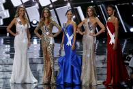 Finalists, (L-R) Miss USA Olivia Jordan, Miss Australia Monika Radulovic, Miss Philippines Pia Alonzo Wurtzbach, Miss Colombia Ariadna Gutierrez, and Miss France Flora Coquerel, stand during the 2015 Miss Universe Pageant in Las Vegas, Nevada December 20, 2015. REUTERS/Steve Marcus ATTENTION EDITORS - FOR EDITORIAL USE ONLY. NOT FOR SALE FOR MARKETING OR ADVERTISING CAMPAIGNS