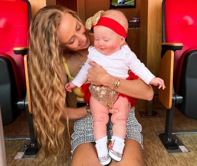 Patrick Mahomes Cradles Daughter Sterling in Leopard Print Baby