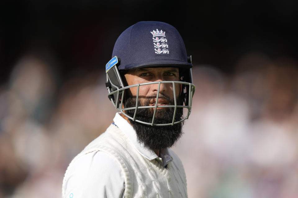 England's Moeen Ali leaves the field after he is dismissed on day three of the fifth Ashes Test match between England and Australia, at The Oval cricket ground in London, Saturday, July 29, 2023. (AP Photo/Kirsty Wigglesworth)