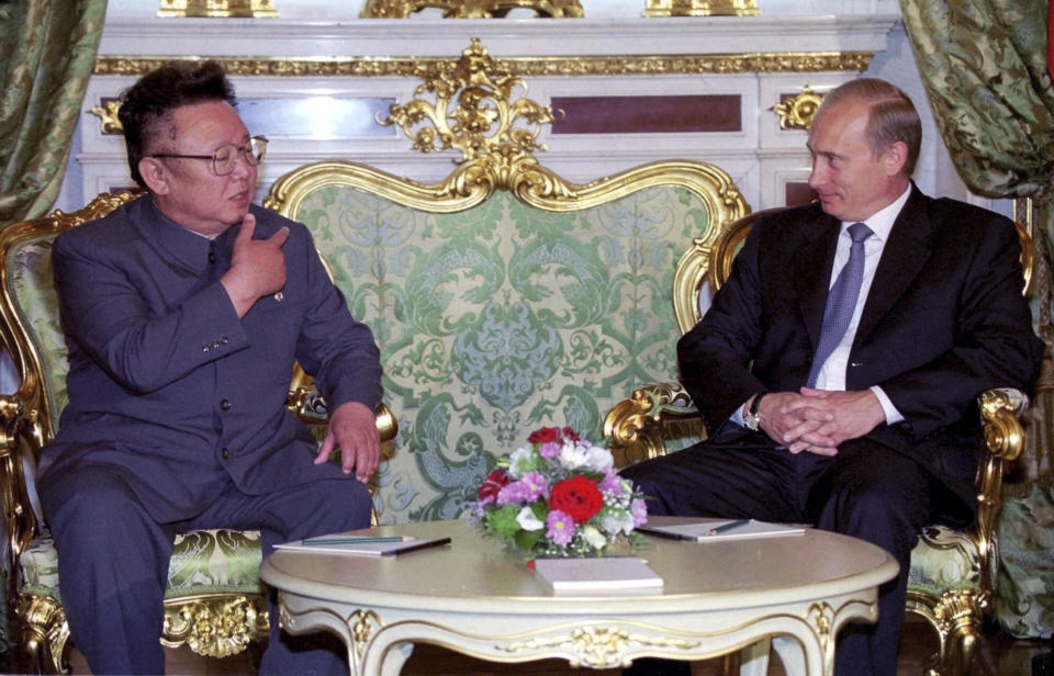 FILE - In this file Saturday, Aug. 4, 2001 file photo, Russian President Vladimir Putin, right, listens to North Korean leader Kim Jong Il, during their meeting in Moscow. North Korean leader Kim Jong Un’s summit with Russian President Vladimir Putin this week expands a diplomatic charm offensive that has included meetings with leaders from China, South Korea and the United States.(Sergei Velichkin/TASS/Sputnik Kremlin via AP, File)