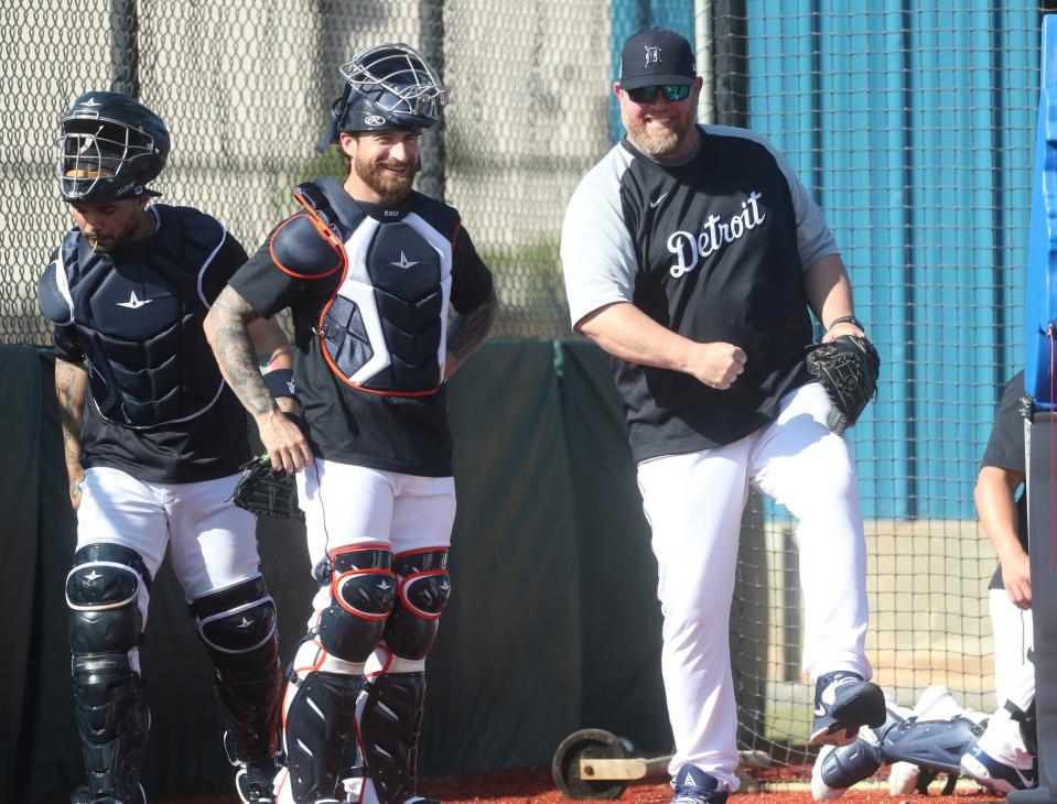 Tigers catcher Eric Hasse and coach Ryan Sienko talk in the bullpen during practice during spring training on Friday, Feb. 17, 2023, in Lakeland, Florida.