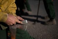 The Wider Image: Oregon inmates find redemption in fighting wildfires