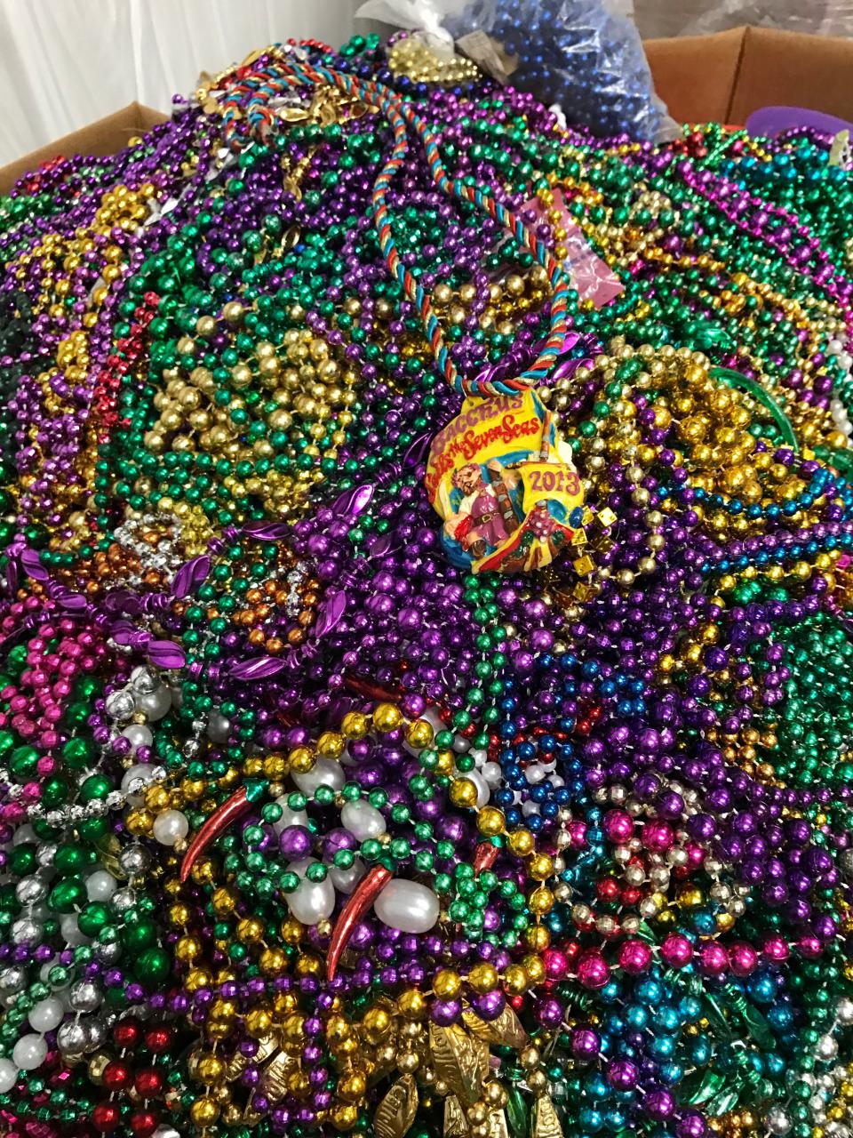 Recycling Mardi Gras beads saves plastic and money.