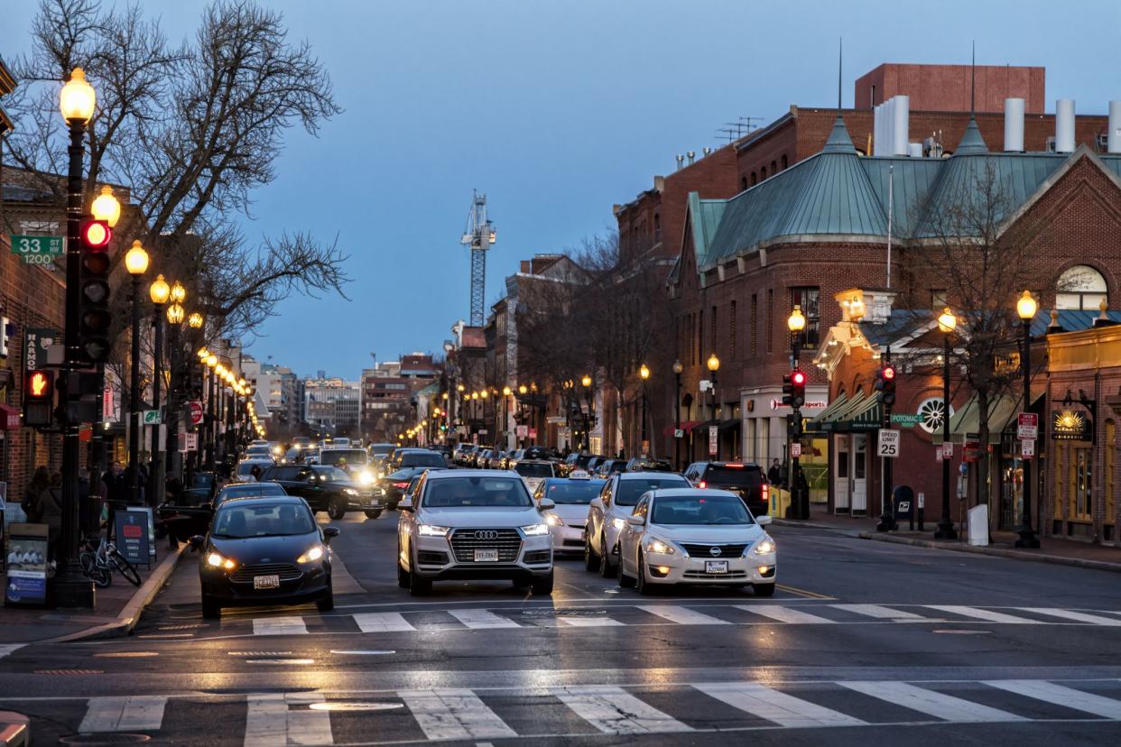 Street scene at night in Georgetown, Washington, District of Columbia, USA.Note to inspector: car Audi Q7 is modified.