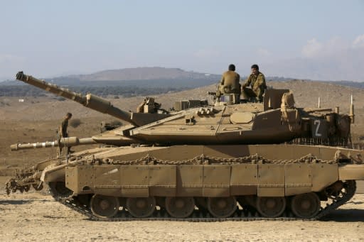 Israeli soldiers set up a tank near Kibutz Merom in the Israeli-annexed Golan Heights on the border with Syria on September 9, 2019