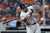 Detroit Tigers' Wilson Ramos swings for his one run RBI during the fourth inning of a baseball game against the Detroit Tigers Wednesday, April 14, 2021, in Houston. (AP Photo/Michael Wyke)