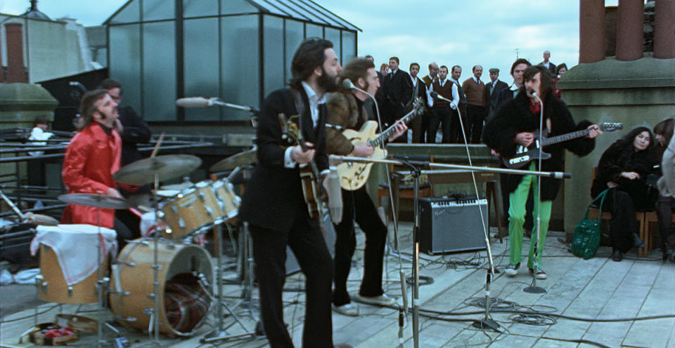 The Beatles: Get Back performing on a rooftop