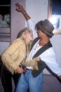 <p>Brad with Elizabeth "E.G." Daily at her album release party in September 1989. Fun fact: She's the voice behind Tommy Pickles from <em>Rugrats</em> and Buttercup from <em>The Powerpuff Girls</em>. The couple remained close friends after dating. <br></p>