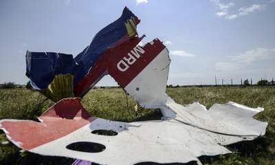 Downing Of Flight MH17 'May Be War Crime'