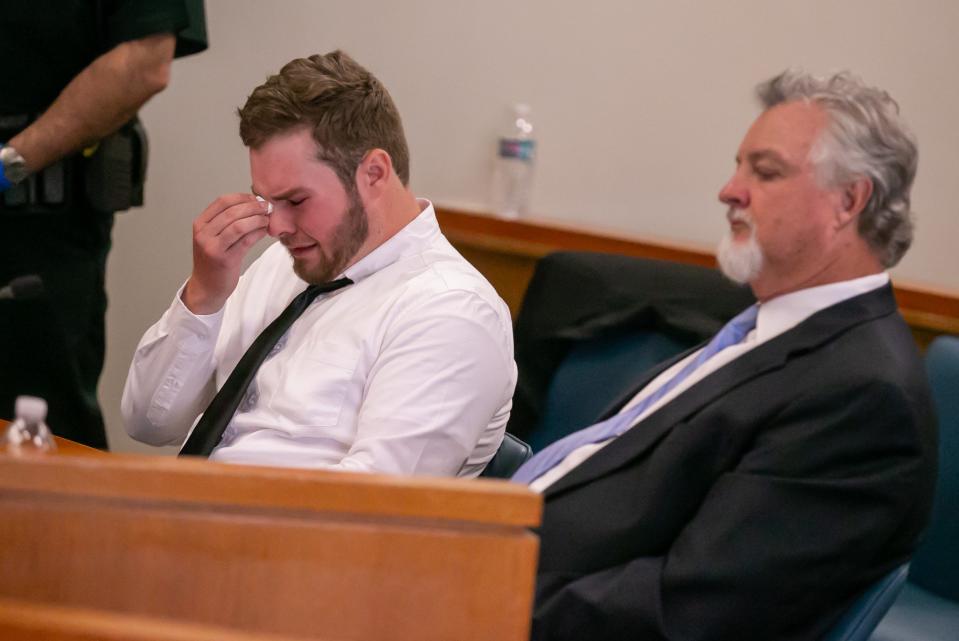 Billy Tomci sobs on Tuesday as he listens to the families of the two girls who died in the 2021 crash.