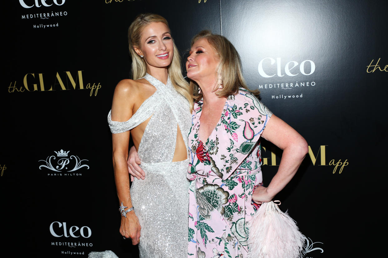 HOLLYWOOD, CALIFORNIA - JUNE 19:  Paris Hilton and Kathy Hilton attend The Glam App Celebration Event at Cleo on June 19, 2019 in Hollywood, California. (Photo by Phillip Faraone/Getty Images)