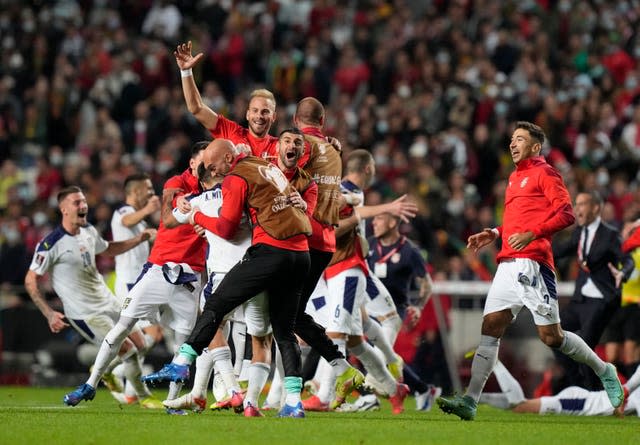 Serbia celebrate after their 2-1 win in Portugal sealed automatic qualification for the 2022 World Cup finals in Qatar