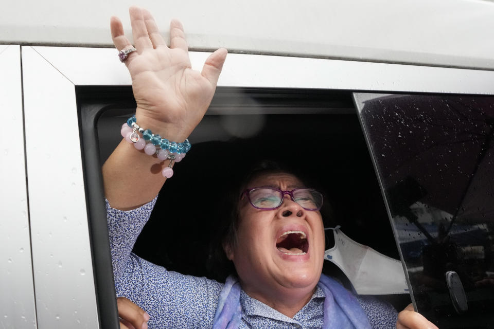 Jailed former Senator Leila de Lima reacts after she goes out of the Muntinlupa City trial court on Monday, Nov. 13, 2023 in Muntinlupa, Philippines. A Philippine court on Monday ordered the release on bail of the former senator jailed more than six years ago on drug charges she said were fabricated to muzzle her investigation of then-President Rodrigo Duterte's brutal crackdown on illegal drugs. Two other non-bailable drug cases against de Lima have been dismissed. (AP Photo/Aaron Favila)
