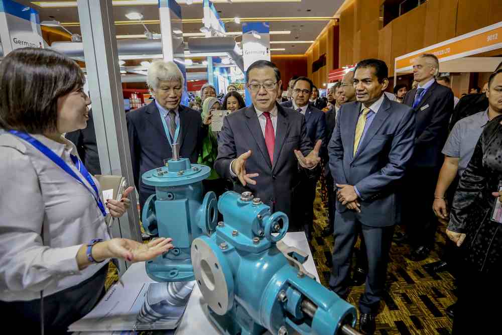 Finance Minister Lim Guan Eng visits a booth after launching the 17th Asian Oil, Gas and Petrochemical Engineering 2019 Exhibition in Kuala Lumpur June 18, 2019. ― Picture by Firdaus Latif