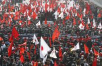 Nepalese supporters of the splinter group in the governing Nepal Communist Party participate in a protest in Kathmandu, Nepal, Friday, Jan. 22, 2021. Thousands of demonstrators rallied in Nepal’s capital Friday protesting against the prime minister who had dissolved the parliament and ordered fresh election because of feuds within the ruling political party. (AP Photo/Niranjan Shrestha)