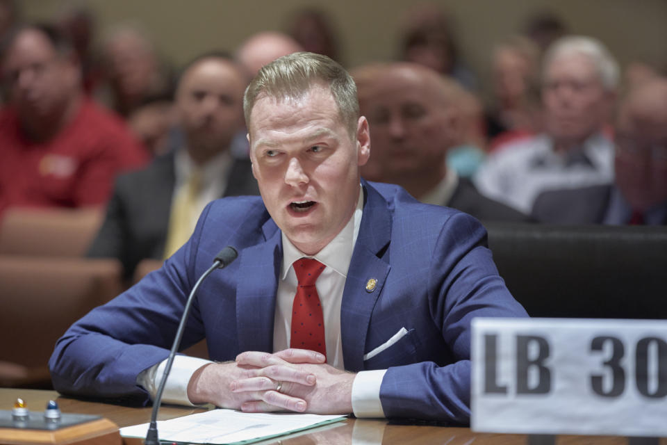 FILE - Neb. state Sen. Brett Lindstrom of Omaha introduces speaks in Lincoln, Neb., Wednesday, Feb. 27, 2019. In Nebraska, the winner of a crowded Republican primary race for governor will be the overwhelming favorite to win in November 2022, and nearly all of the state's GOP leaders have lined up behind businessman Jim Pillen. Lindstrom who has emerged appears to have a shot at winning the nomination in part thanks to an endorsement from the mayor of Omaha, the state's biggest city. (AP Photo/Nati Harnik, File)