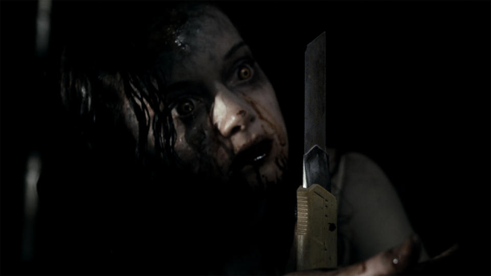 Jane Levy with box cutter in Evil Dead