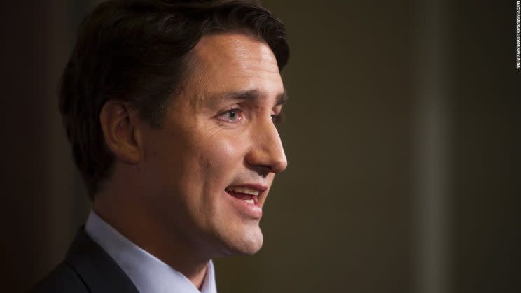 PM Trudeau has some advice for men when it comes to flushing a urinal at a bar. Photo from The Canadian Press