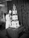 <p>When the Queen’s younger sister wed her first husband, Anthony Armstrong-Jones in 1960, it was Frank Jacobs of J. Lyons who created the masterpiece. It took five weeks to complete, stood five-feet tall and weighed 150lbs.<em> [Photo: Getty]</em> </p>