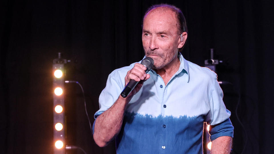 Lee Greenwood at the microphone.
