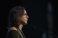 In this Monday, Oct. 18, 2021 photo, Michele Rosenthal gives opening remarks at the Eradicate Hate Global Summit in Pittsburgh. Rosenthal's brothers, Cecil and David Rosenthal, were killed in the Oct. 27, 2018, mass shooting at the Tree of Life synagogue. (AP Photo/Rebecca Droke)