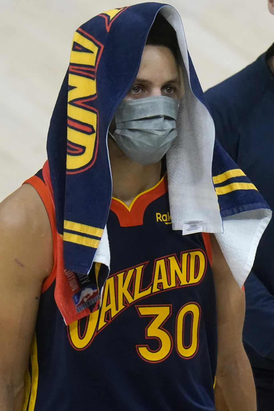 Golden State Warriors guard Stephen Curry (30) looks on as he comes off the floor in the second half during an NBA basketball game against the Utah Jazz, Saturday, Jan. 23, 2021, in Salt Lake City. (AP Photo/Rick Bowmer)