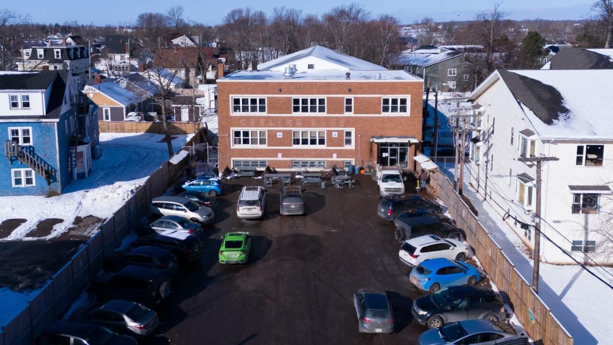 The Community Outreach Centre will move from its current Euston Street location, shown in a drone image, to the Park Street site within 60 days, the provincial government said on Tuesday. (Shane Hennessey/CBC - image credit)