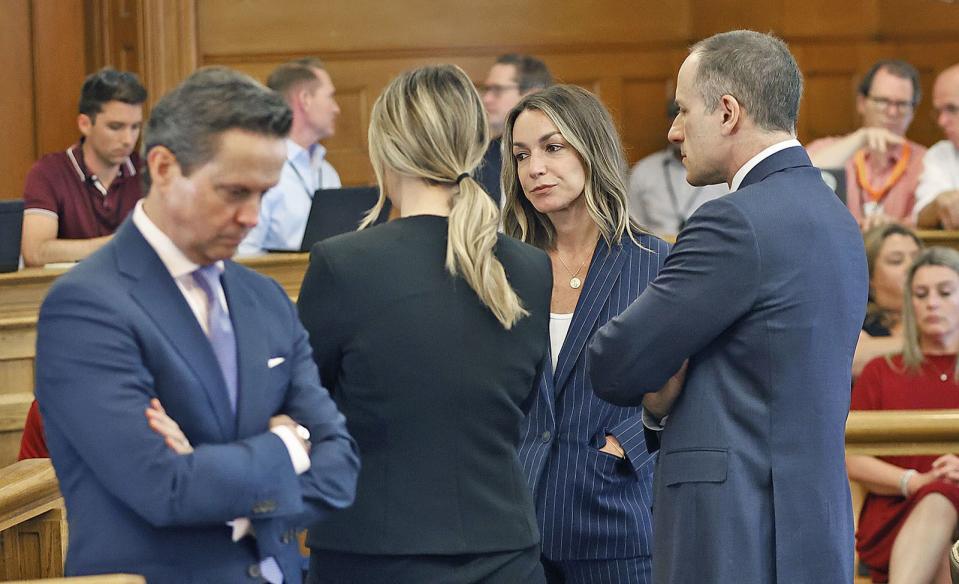 Alan Jackson, From left, Liza Little, defendant Karen Read and David Yanetti wait for a question from the jury as the jury deliberates in Read's murder trail, Wednesday June 26, 2024, at Norfolk Superior Court in Dedham, Mass. Read is charged with second-degree murder in the January 2022 death of her boyfriend Boston Police Officer John O’Keefe. (Greg Derr/The Patriot Ledger via AP, Pool)