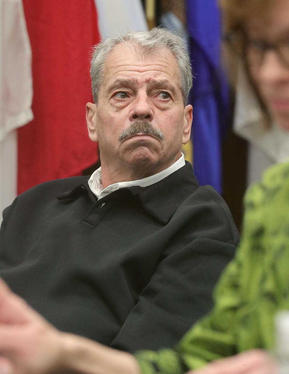 Former Public Utilities Chairman Sam Randazzo listens to proceedings during an arraignment hearing with judge Susan Baker Ross on charges related to the FirstEnergy scandal on Feb. 13 in Akron.