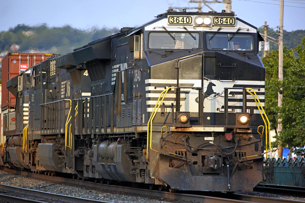 FILE - A Norfolk Southern freight train runs through Homestead, Pa., Wednesday, Sept. 14, 2022. Most railroad workers weren't surprised that Congress intervened this week to block a railroad strike, but they were disappointed because they say the deals lawmakers imposed didn't do enough to address their quality of life concerns about demanding schedules and the lack of paid sick time. (AP Photo/Gene J. Puskar, File)