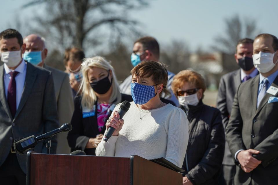 Michigan Department of Health and Human Services Director Elizabeth Hertel speaks during a press conference before the opening of a drive-thru vaccination clinic at the former Sears Auto Center site at the Lakeside Mall in Sterling Heights on Wednesday, March 31, 2021. 