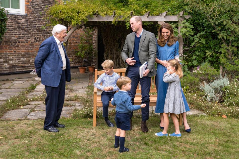 The royal family spends time with Sir David Attenborough in the gardens of Kensington Palace in September 2020. 