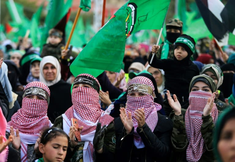 Hamas supporters take part in a rally marking the 30th anniversary of the founding of the Islamist movement, in Gaza City, on December 14, 2017