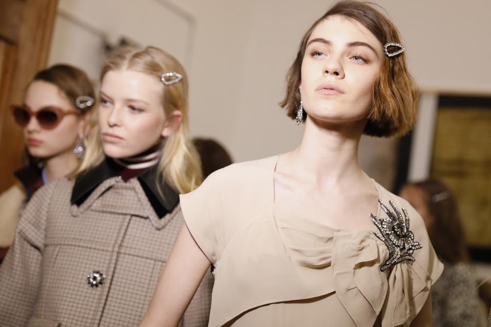 At the No. 21 show during Milan Fashion Week, hairstylist Anthony Turner decorated the hair with a classic '90s hair accessory—the bendy clip.