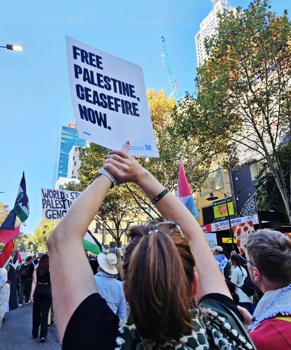 Pro-Palestinian marchers in Melbourne, Australia. (@MixtUpMixy via X)
