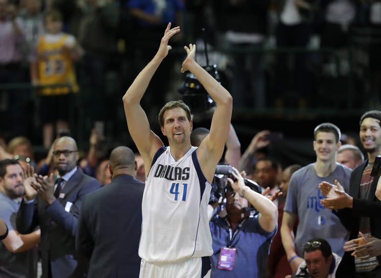Dirk Nowitzki gives everyone else a round of applause. (Getty Images)