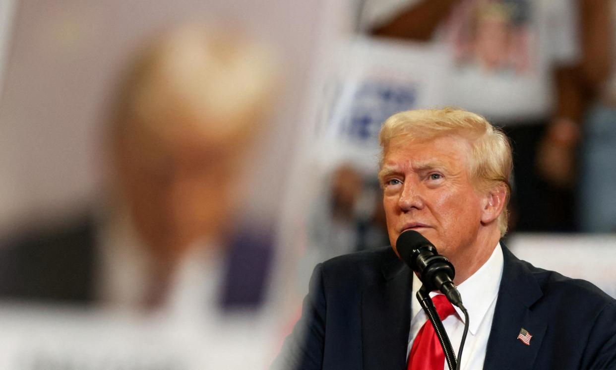 <span>Donald Trump at at the rally in Georgia on Saturday.</span><span>Photograph: ümit Bekta?/Reuters</span>