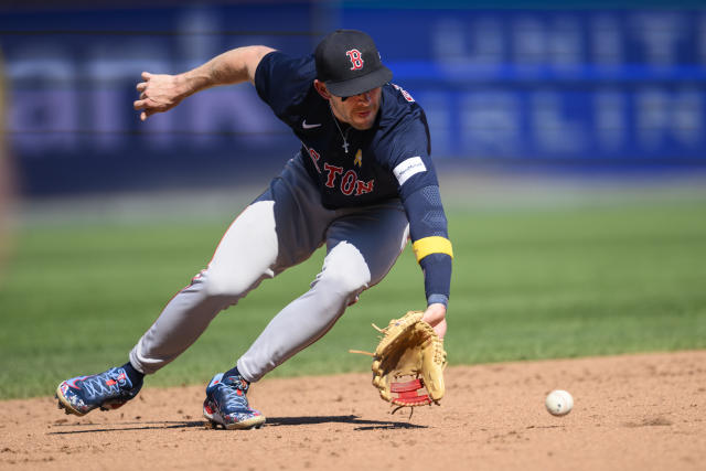 Baseball: Masataka Yoshida gets 2 hits, RBI before injury scare