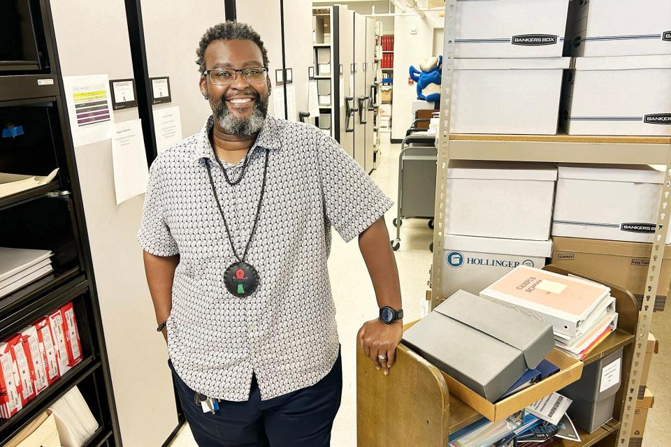 Jason McGowan stands in the archives of the Albert Gore Sr. Research Center at Middle Tennessee State University in Murfreesboro, Tenn. For the next 30 months, McGowan is traveling around the country conducting interviews for the Brown v. Board of Education Oral History Project.