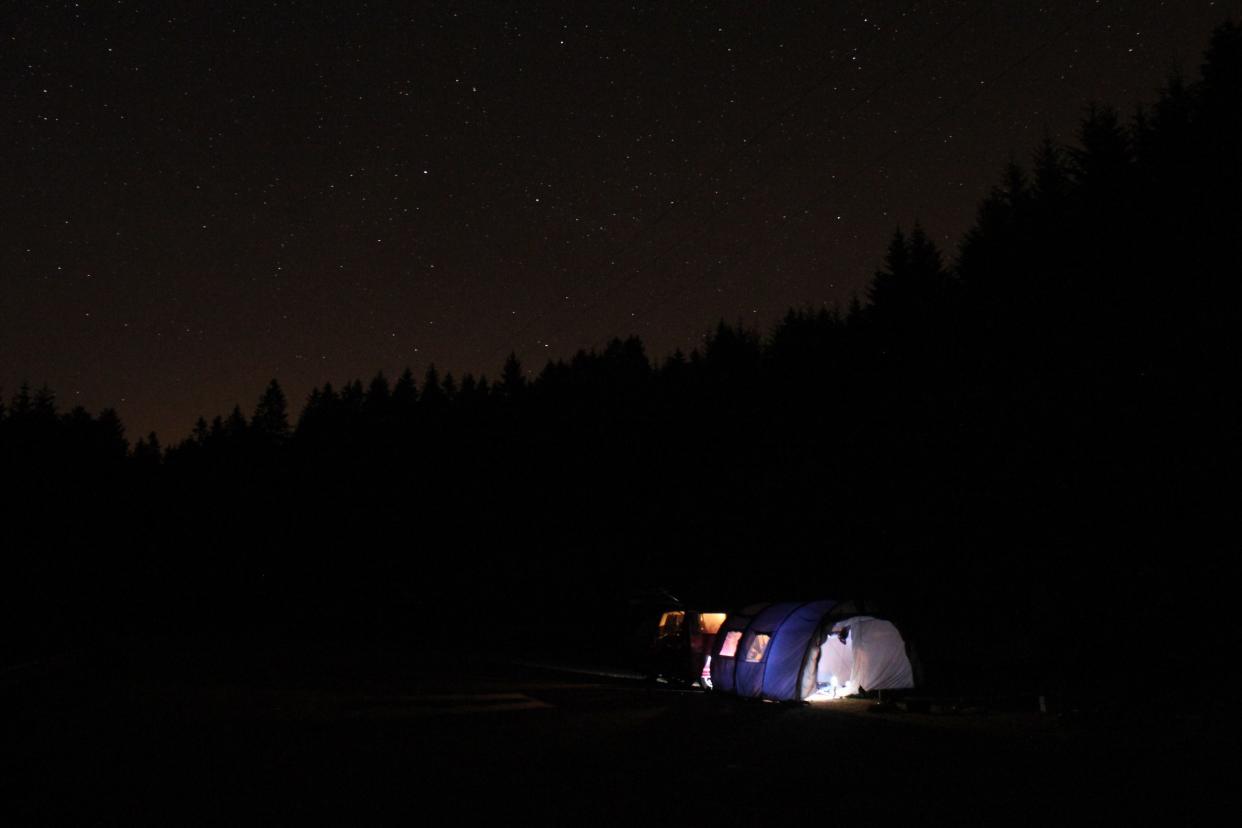 Tent under starry night