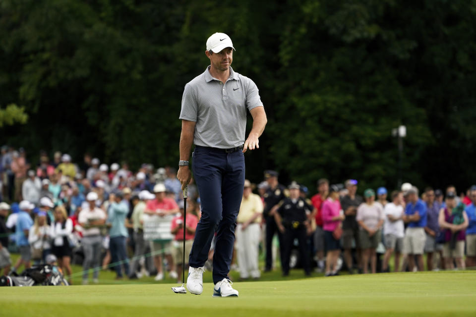 Rory McIlroy, of Northern Ireland, reacts after a shot on the 12th green during the first round of the Travelers Championship golf tournament at TPC River Highlands, Thursday, June 23, 2022, in Cromwell, Conn. (AP Photo/Seth Wenig)