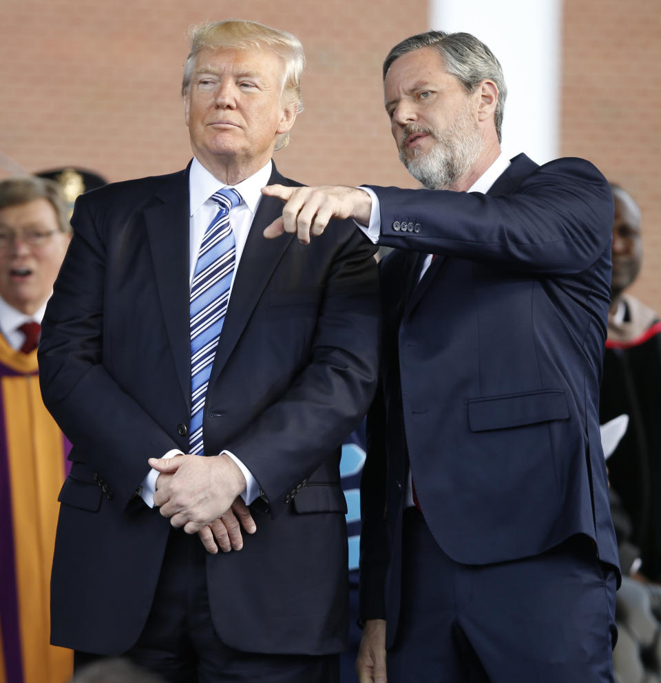 Trump and Falwell at the school&rsquo;s 2017 commencement.&nbsp;Falwell was among the first evangelical leaders&nbsp;to endorse Trump, in January 2016.&nbsp; (Photo: Steve Helber / ASSOCIATED PRESS)