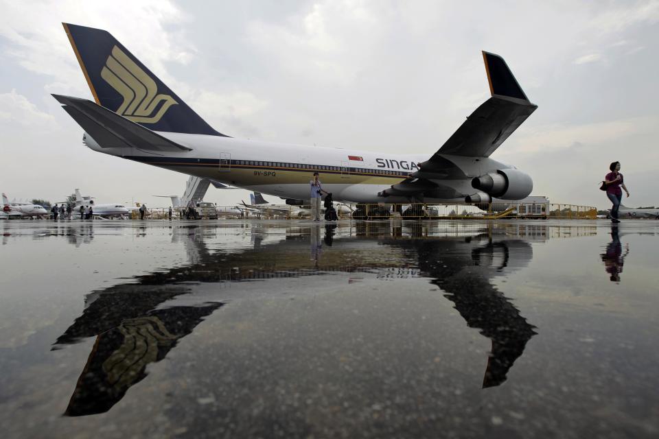 Singapore Airlines&#39; (SIA) Boeing 747-400 passenger jet with registration 9V-SPQSINGAPORE-AIRLINE/TATA-SONS-INDIA REUTERS/Tim Chong/Files (SINGAPORE - Tags: BUSINESS TRANSPORT)