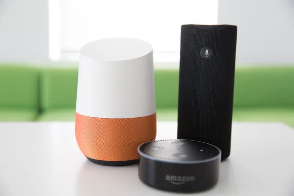 (L-R) Google Home, Amazon Echo Dot, Amazon Tap