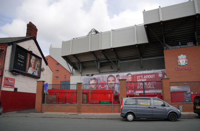 A tribute is displayed on an advertising board next to Anfield, home of Liverpool FC, following the death of Queen Elizabeth II on Thursday. All games in the Premier League and EFL this weekend have been postponed following the death of the Queen, the governing bodies have announced. Picture date: Friday September 9, 2022. (Photo by Peter Byrne/PA Images via Getty Images)