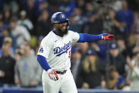 Los Angeles Dodgers' Teoscar Hernandez celebrates his home run during the second inning of a baseball game against the St. Louis Cardinals Friday, March 29, 2024, in Los Angeles. (AP Photo/Jae C. Hong)