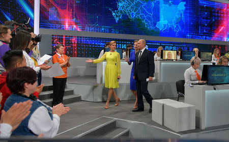 Russian President Vladimir Putin enters a studio before a live nationwide broadcast call-in in Moscow, Russia June 7, 2018. Sputnik/Alexei Druzhinin/Kremlin via REUTERS