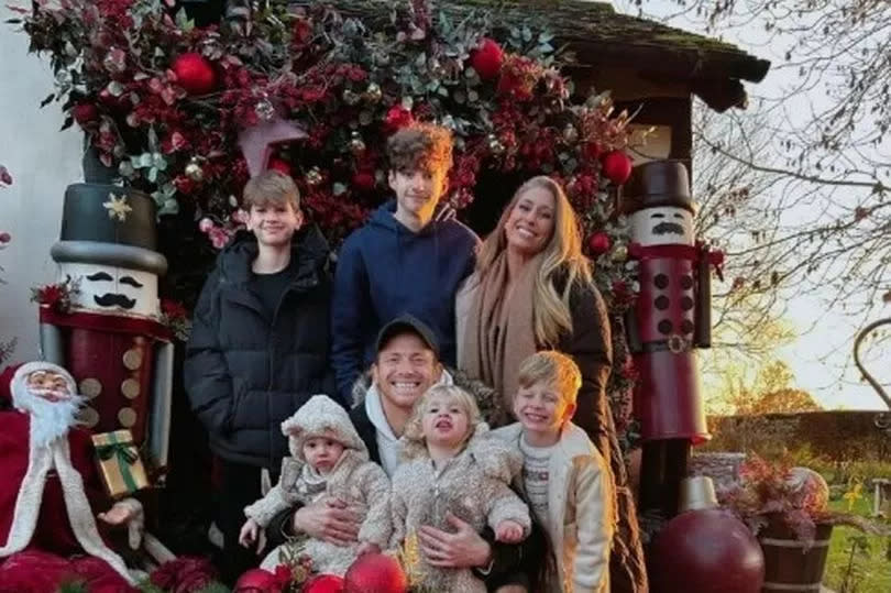 Stacey Solomon poses with family at her Essex home