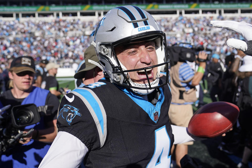 Carolina Panthers' Eddy Pineiro (4) celebrates after kicking the game-winning field goal after an an NFL football game against the Houston Texans, Sunday, Oct. 29, 2023, in Charlotte, N.C. The Carolina Panthers won 15-13. (AP Photo/Erik Verduzco)