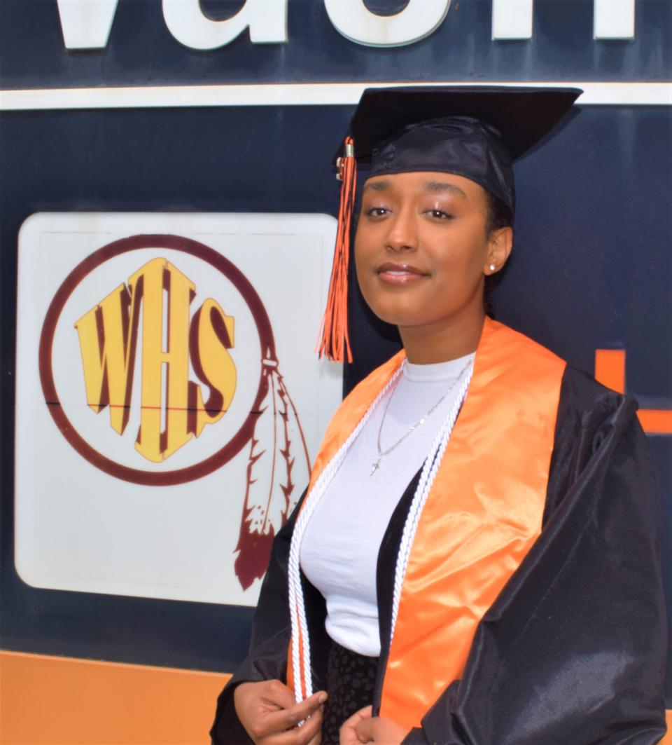 Susana Gebrekidan, a senior at Washington High School, prepares to graduate with the Class of 2022 this week. Susana poses for a portrait at WHS on May 24, 2022.